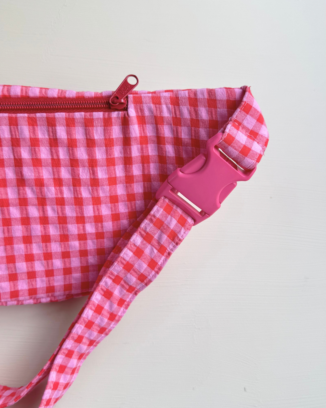 RIÑONERA ROJO Y ROSA